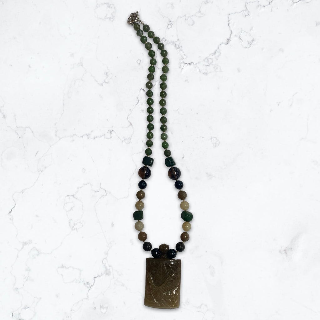 Jade Pendant with a Bird Carving