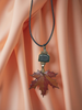 Orange Maple Leaf Pendant with a Jade Bead