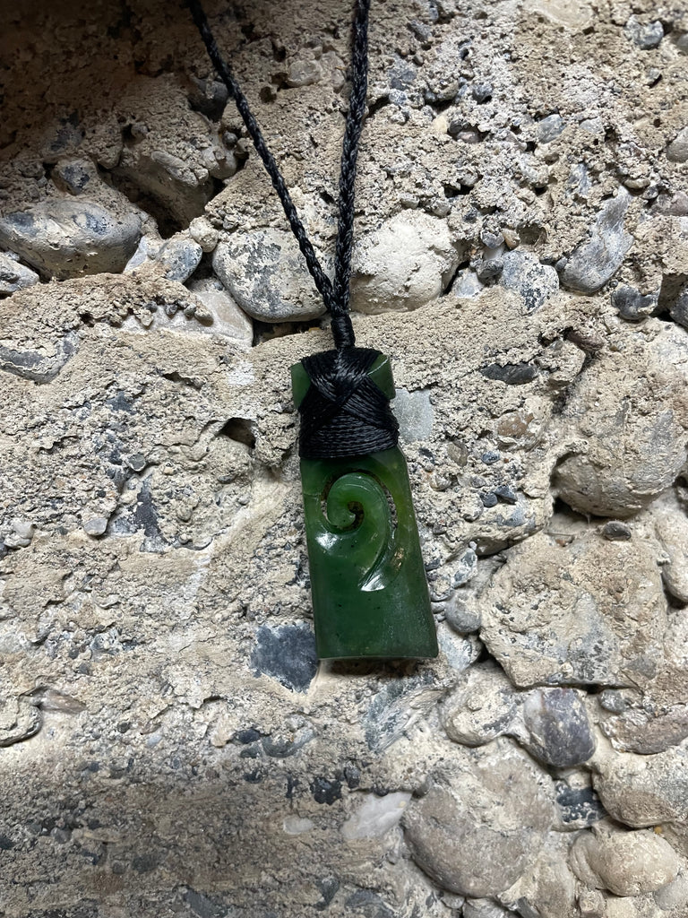 Jade adze (Toki) with spiral (Koru)