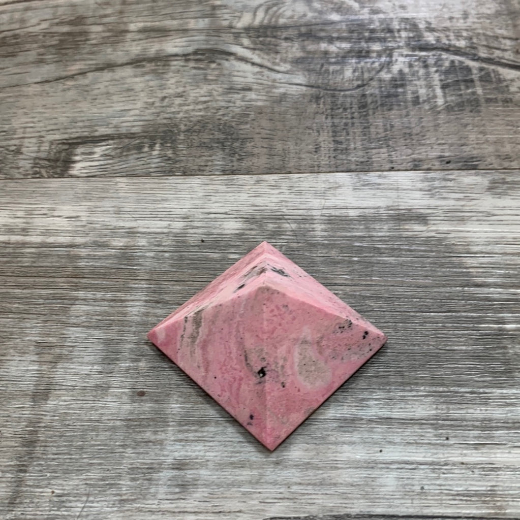 Rhodochrosite pyramids and obelisk