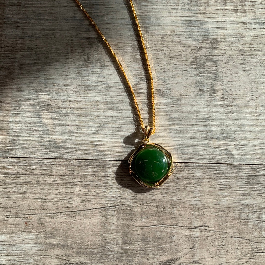 Jade Circle set in gold rectangle
