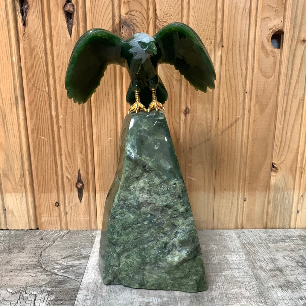Jade Eagle landing on mountain top