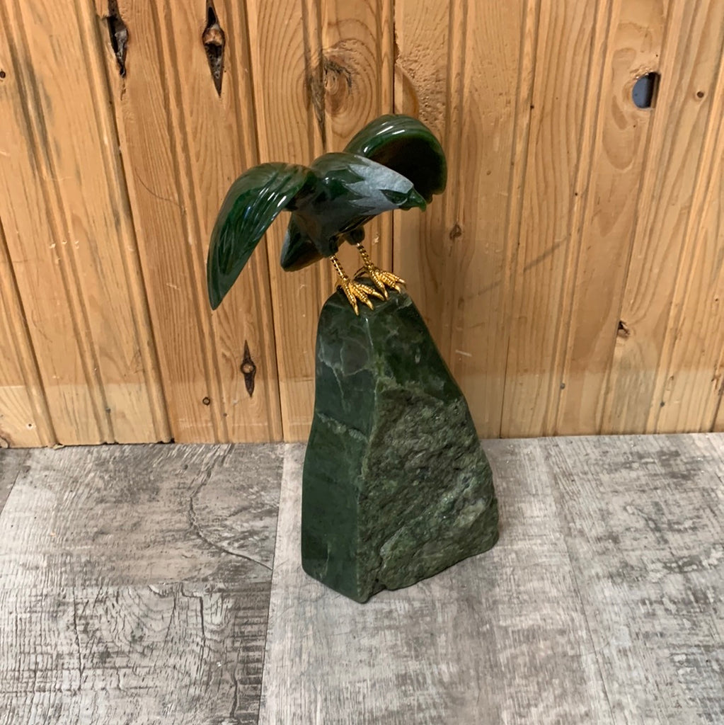 Jade Eagle landing on mountain top